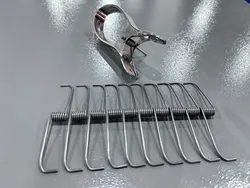 Máquina para fabricar resortes de bisagra