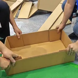Macchina automatica per la produzione di scatole in cartone ondulato Aopack con sistema di gestione degli ordini