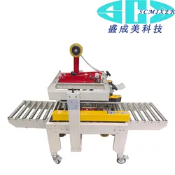 Máy tự động mở gói Scmxier và máy niêm phong hộp carton