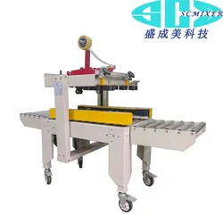 Máy tự động mở gói Scmxier và máy niêm phong hộp carton