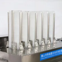 Máquina Automática Compacta para Carga de Bandejas y Envasado de Galletas