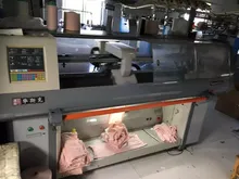 Machine à tricoter informatisée d'occasion