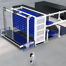 Sistema di carico e scarico automatico efficiente per magazzini a piastre