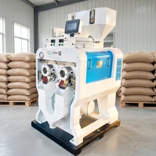 Machine à décortiquer le riz à rouleau émeri avec traitement à grande échelle pour le blanchiment du riz