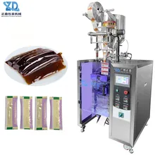 Macchina automatica per il confezionamento di sciroppi liquidi con riempimento di bustine con intaglio a V Macchina automatica per il confezionamento di sciroppi liquidi con riempimento di bustine con intaglio a V