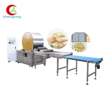 Macchina per la produzione di fogli di pasta per involtini primavera a molla tipo rullo Macchina per la produzione di fogli di pasta per involtini primavera a molla tipo rullo