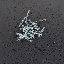 Pequeño muelle de compresión de acero de resorte para bolígrafo