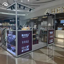 コーナースタイルの小売ソリューション用コンパクトな光沢のあるディスプレイラック