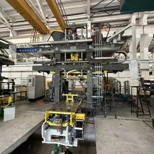 Disparador automático de núcleo con sistema de eyección inferior