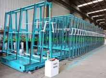 Sistema di scaffali in vetro elettrici mobili per stoccaggio di vetro in magazzino