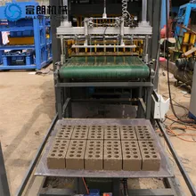 Macchina per la produzione di mattoni completamente automatica con sistema di vibrazione e compressione