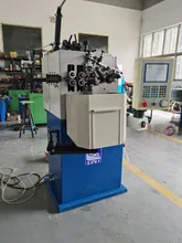 Máy cuốn lò xo nén hai trục