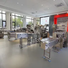 Máquina de empaquetado en flujo automática para apilar galletas pequeñas de múltiples capas