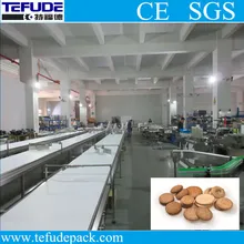 Sistema di macchina automatica per imballaggio biscotti cracker, ordinamento, alimentazione, impilamento, sacchetto a cuscino per confezioni familiari