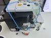 Macchina da cucire overlock pneumatico reversibile a quattro fili ad alta velocità con bloccaggio finale del filo
