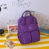 Mochila de color sólido, suave, de gran capacidad, mochila de nylon para la escuela y el aprendizaje