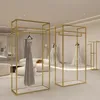 Suportes de roupas personalizados por atacado, suportes de exibição, cabide para roupas, cabide de roupas dourado, suporte de exibição de roupas para loja, suporte de metal montado na parede para boutique