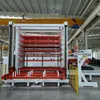 Sistema di stoccaggio automatizzato con carico e scarico automatico per macchina da taglio laser