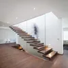 Aangepaste moderne fancy ontwerp glazen leuning houten mono stringer zwevende open treden trap