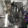 Doppelspindel-Syntec-Steuerung Drehfräsmaschine unterstützt komplexe G-Code-Programme für maßgeschneiderte Autoteile