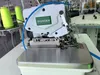 Macchina da cucire overlock pneumatico reversibile a quattro fili ad alta velocità con bloccaggio finale del filo