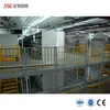 Rak Gudang Racking Masuk Racking Kereta Otomatis Rak Penyimpanan Multi Mendukung Mezanin