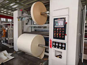 Human-Computer Interface Slitting Rewinding Machine That Adopts Auto Loading System and Equipped with Web Guiding System