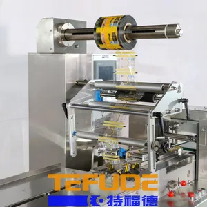 Integrated Food Packing Line with Tray Stacking and Flow Wrapping System