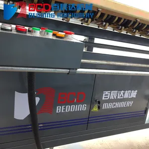 Automatic Assembling Machine Mattress Coil Spring Roll Making Machine